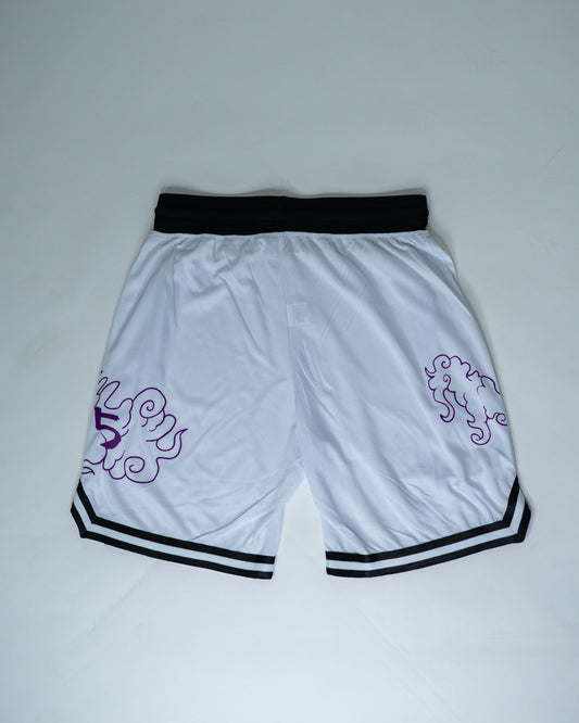 Back view of white Roki Awakened gym shorts featuring purple accents and Roki logo
