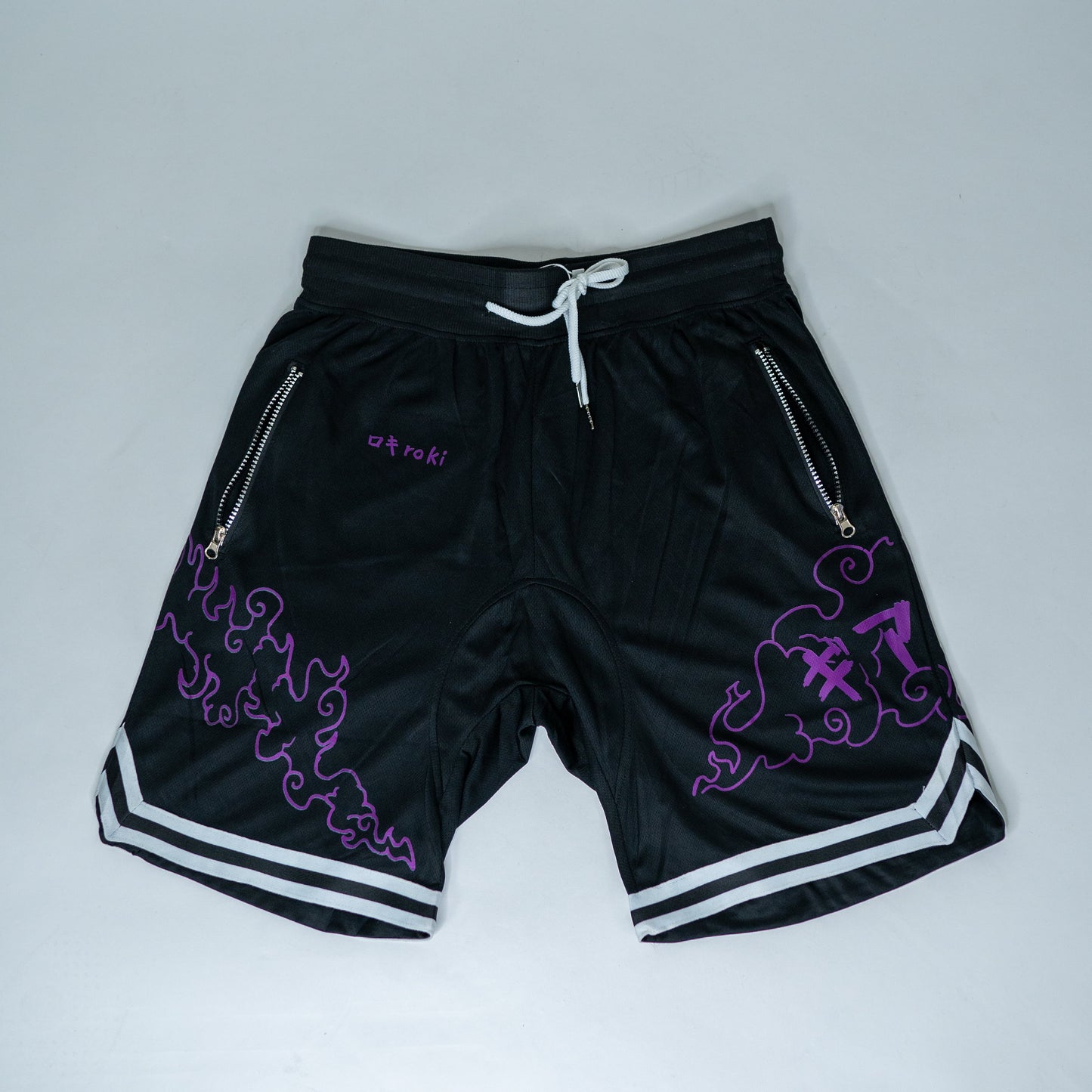 Front view of black Roki Awakened gym shorts featuring purple accents and Roki logo