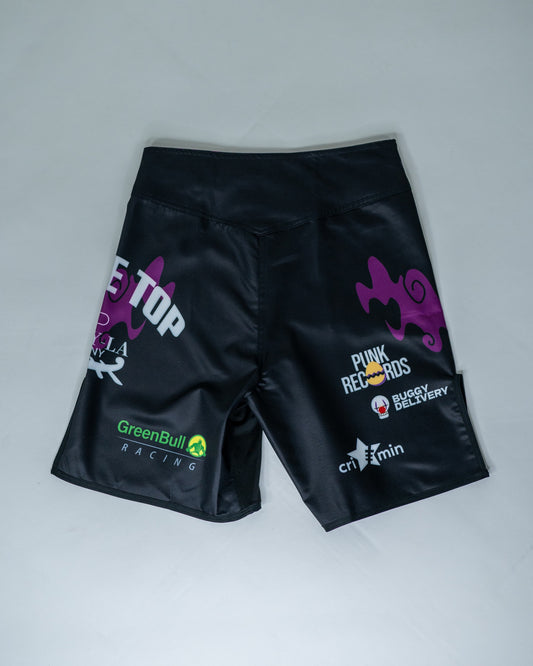 Back view of Roki grand line fight shorts, featuring purple accents, Roki logo, and manga-inspired sponsor logos