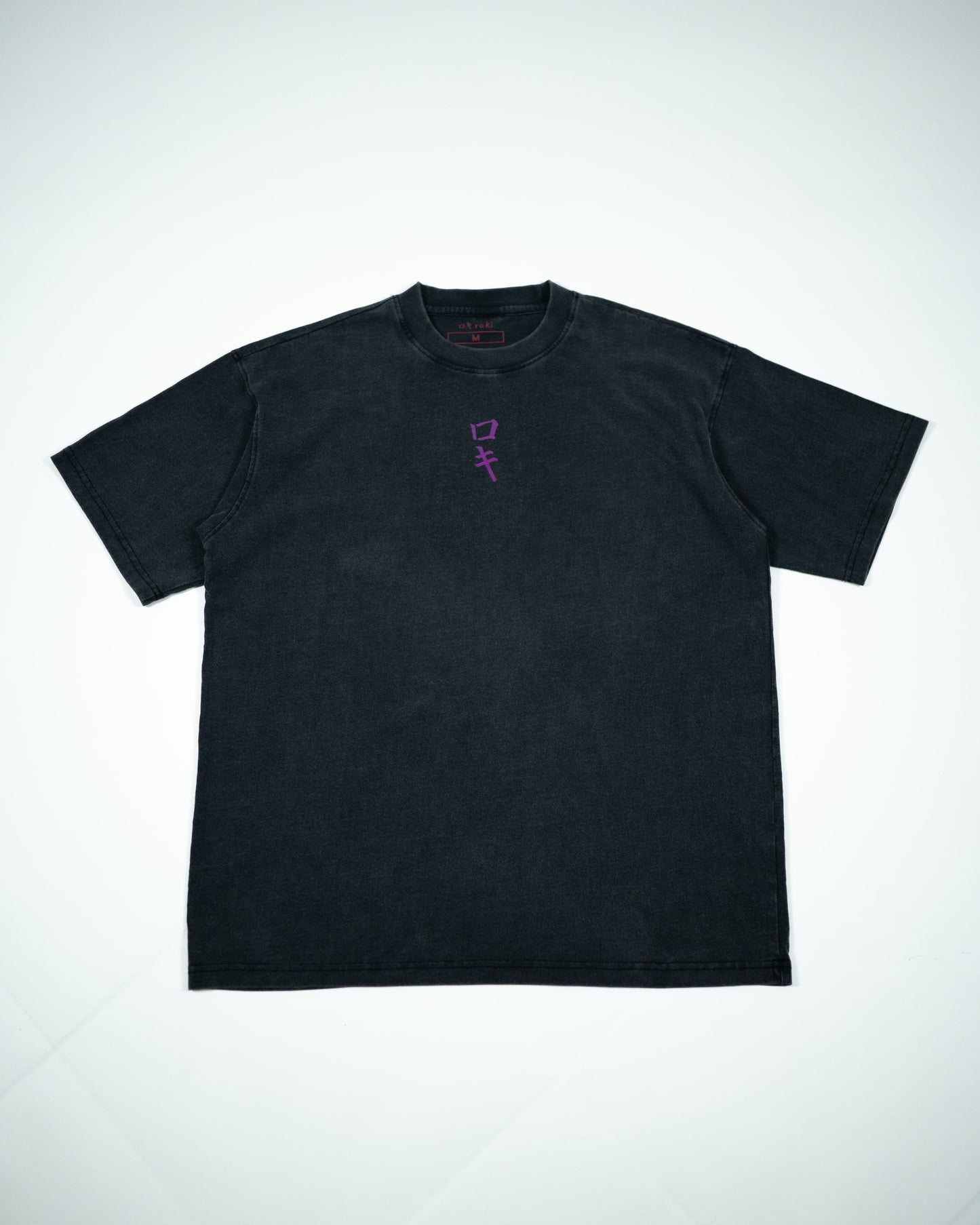 Front view of a black Roki muki muki oversized t-shirt featuring a purple Roki logo