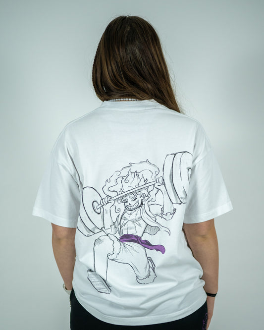 Back view of a model wearing a white Roki muki muki oversized t-shirt featuring a manga-inspired design