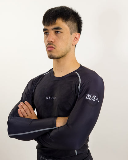 demon slayer rash guard being worn by man