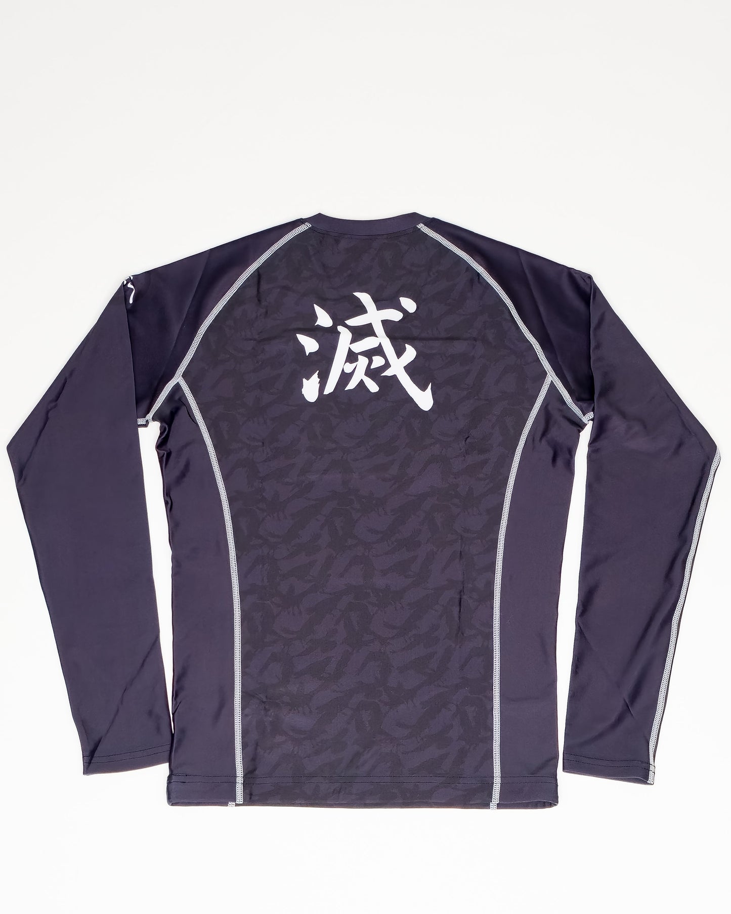 Black long sleeve demon slayer mma rash guard shirt with white text on a white background
