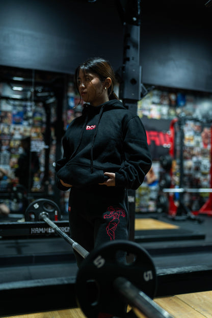 Female fighter wearing Baki anime hoodie, wraps and joggers