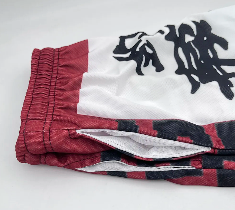 Folded red and white Hajime no Ippo boxing shorts