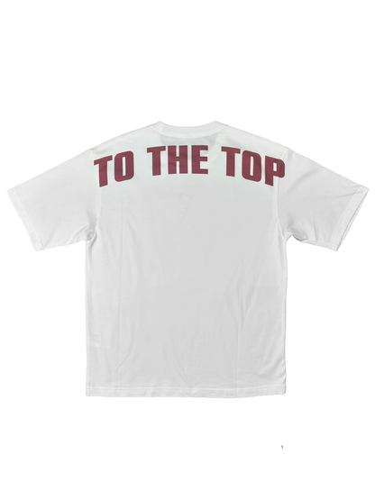 Back of white shirt with To The Top logo