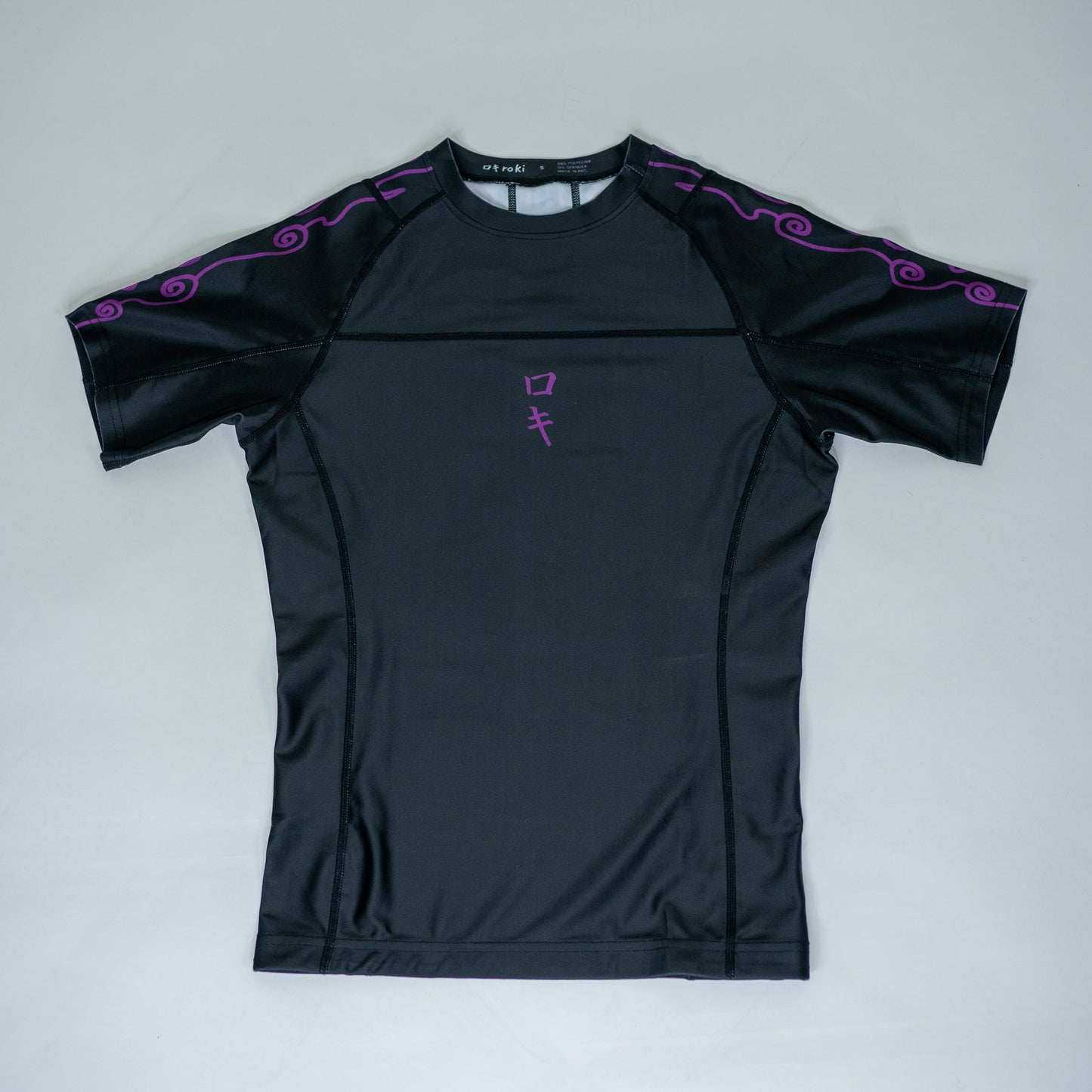 Front view of a black Roki Awakened compression shirt