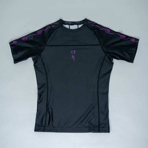Front view of a black Roki Awakened compression shirt
