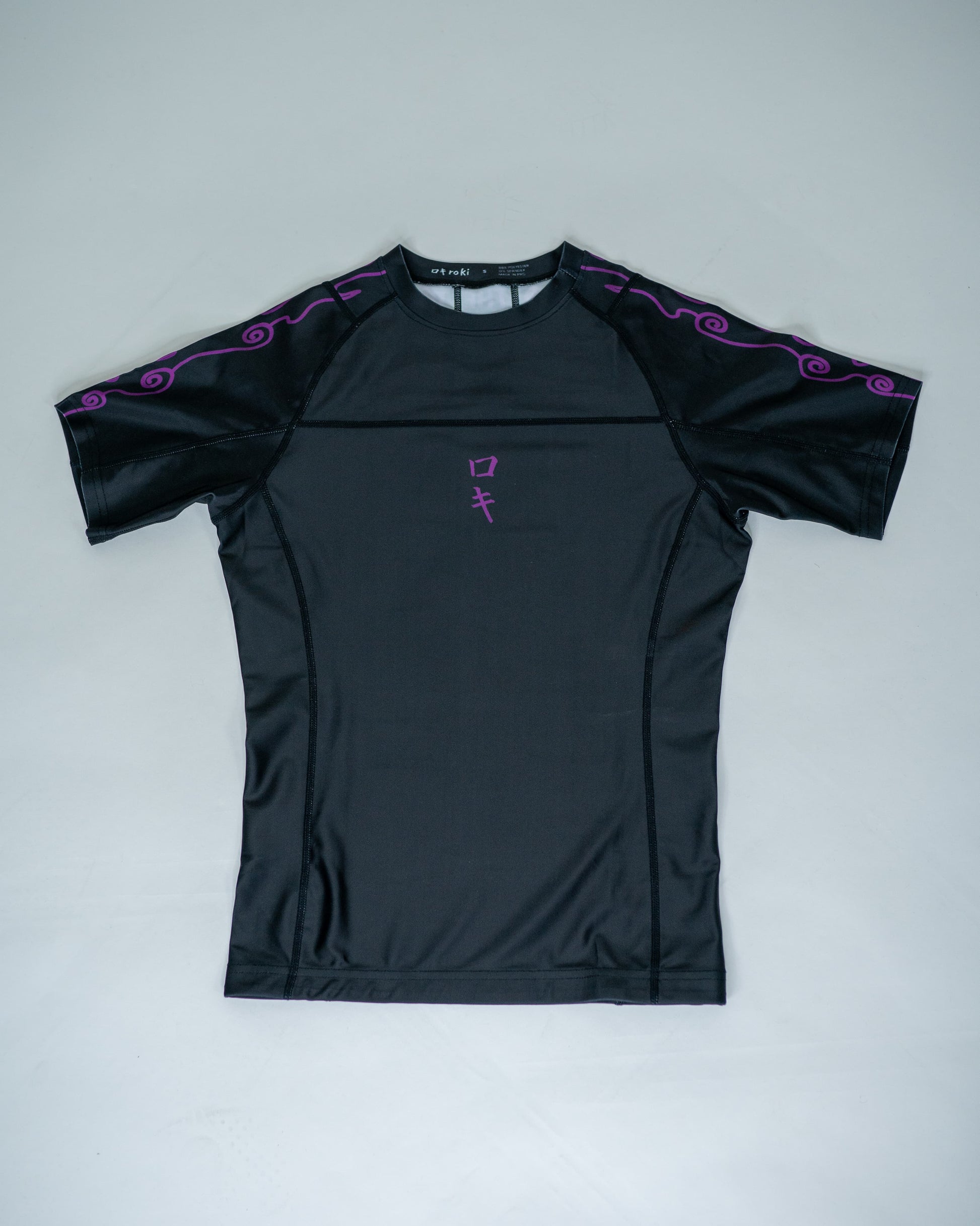 Front view of a black Roki Awakened compression shirt