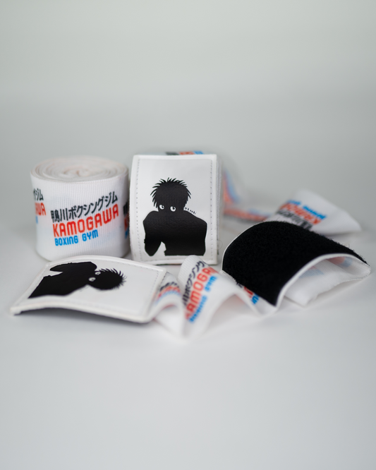 Anime boxing hand wraps with Kamogawa Boxing Gym design and silhouette of Ippo, featuring large Velcro and rolled 4.5m wrap
