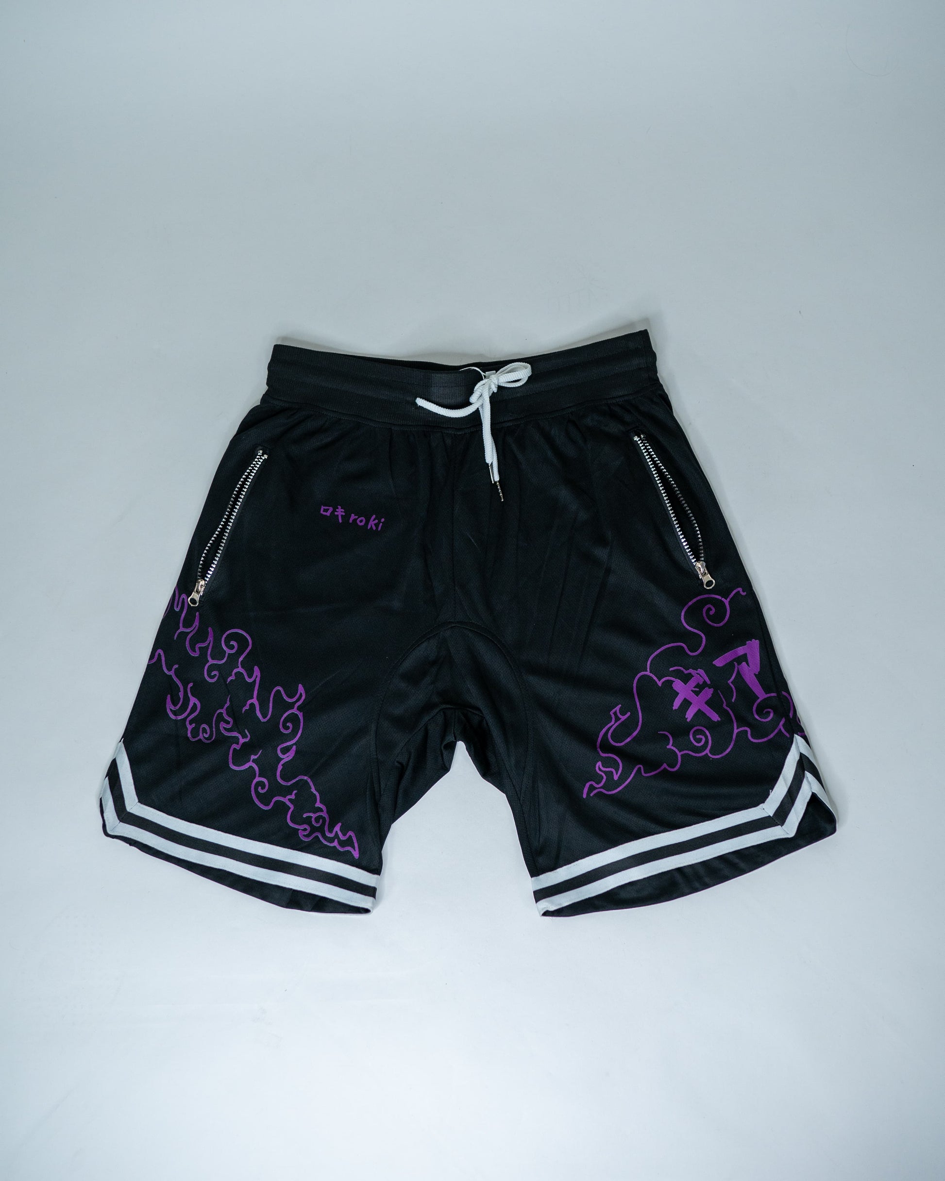 Front view of black Roki Awakened gym shorts featuring purple accents and Roki logo