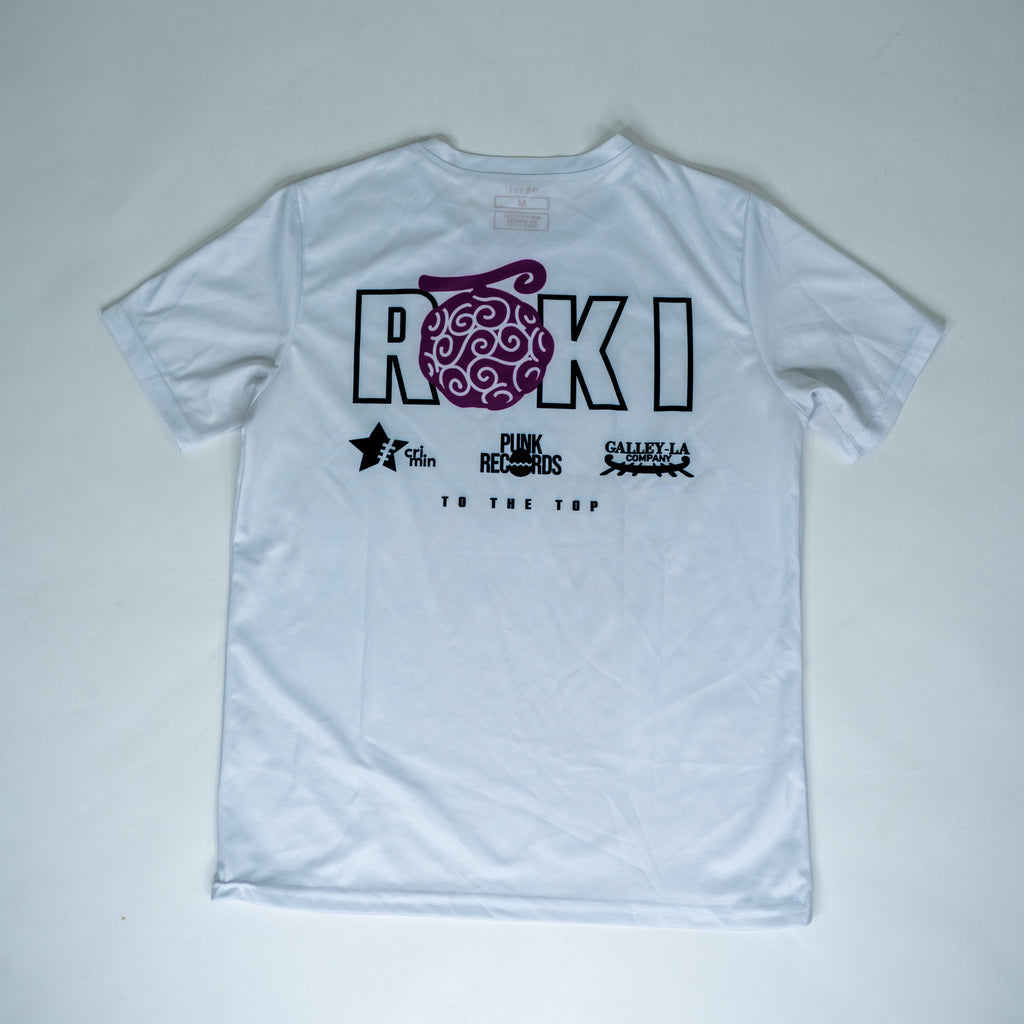 Back view of a Roki Liberation training shirt with anime-inspired sponsor logos