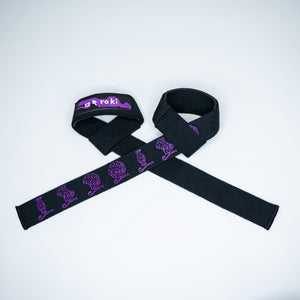 Close-up of black Roki fruit lifting straps featuring purple accents