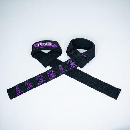 Close-up of black Roki fruit lifting straps featuring purple accents