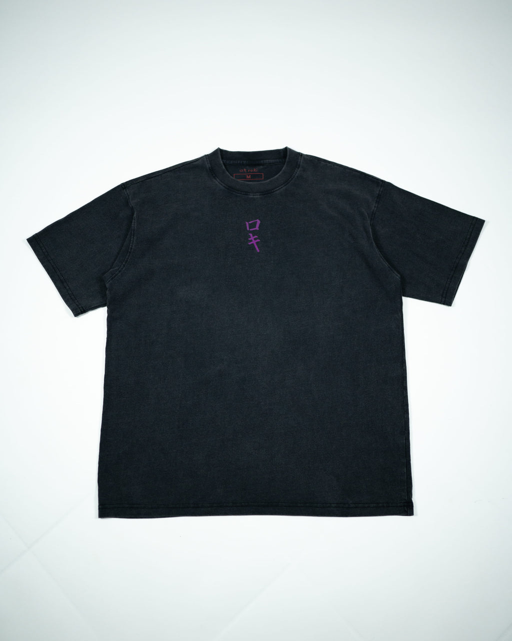 Front view of a black Roki muki muki oversized t-shirt featuring a purple Roki logo