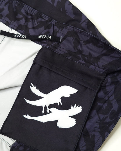Black inner pocket with white crow design and visible brand logo on a light background