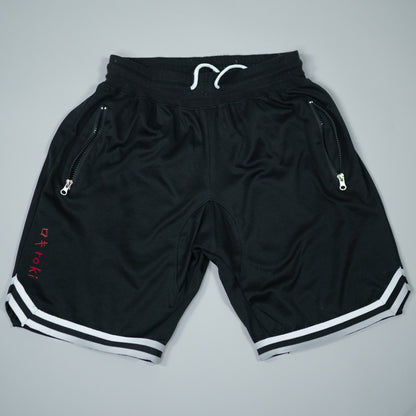 Roki Gym Shorts in black with white trim – lightweight, quick-dry, zipped pockets, and 4-way stretch for gym training